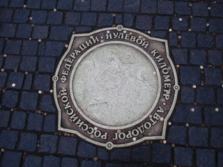 Circle, City, close-up, cobblestone, communication, directly above, finance, Footpath, geometric shape, high angle view, manhole, metal, no people, pattern, paving stone, Shape, silver colored, stone,
