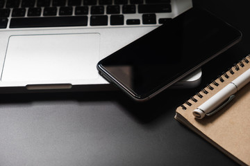 Laptop , tablet and smart phone .on table. Modern digital devices and gadgets.