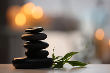 Stack of spa stones on blurred background