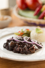 Carne de puerco en salsa roja