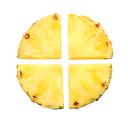Composition with slices of juicy pineapple on white background