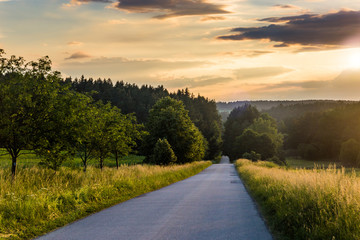 Obraz premium Rural road in czech republic in evening time