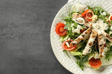 Tasty salad with meat and cherry tomatoes on plate