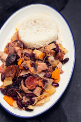 typical portuguese dish feijoada transmontana on white plate