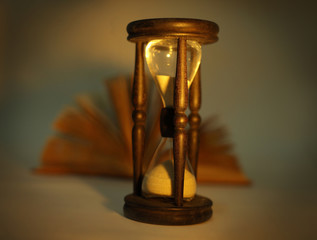 Sand glass clock with book