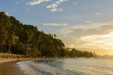 Sunset on Las Cabanas beach, El Nido Palawan. Philippines