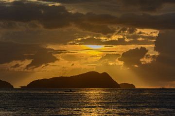 Fototapeta premium El Nido Palawan, Philippines. Tropical clouds in the sea on a sunset background. Cloudy landscape in the sea. 