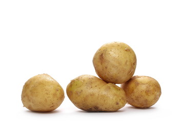 Young organic potatoes isolated on white background