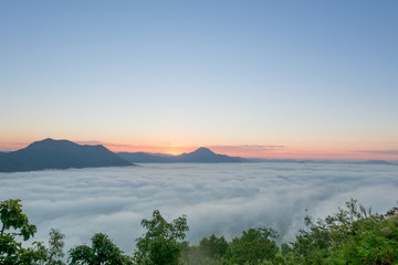 sunrise in the morning with fog over mountain