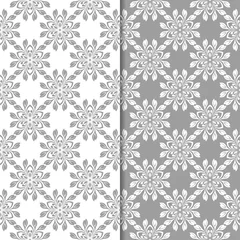 Foto op Canvas White and gray floral ornamental designs. Set of seamless patterns © Liudmyla