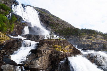 Fototapeta na wymiar The Langfossen waterfall just outside Etne in Hordaland, Norway.
