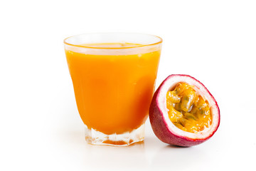 Passion fruit and passion fruit juice In a glass White isolated background 
