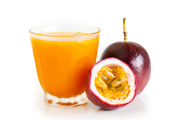 Passion fruit and passion fruit juice In a glass White isolated background 