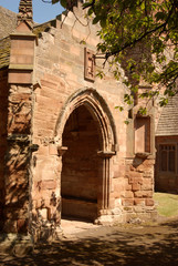 Fototapeta na wymiar arched entrance to Whitekirk 12th century church in East Lothian
