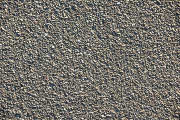 full frame image of wall with gray gravel background
