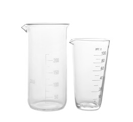 Glass beakers on white background