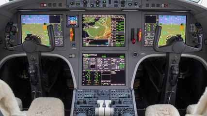 Modern glass digital cockpit of an passenger aircraft.