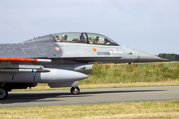 Fototapeta na wymiar Military fighter jet cockpit with pilots
