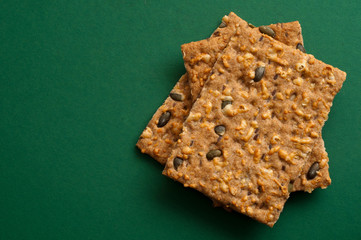bread with nuts on a green background