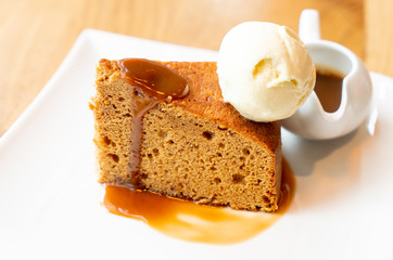 cake with vanilla ice-cream and toffee caramel sauce