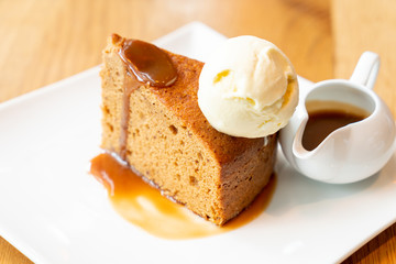 cake with vanilla ice-cream and toffee caramel sauce
