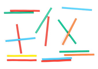 Colorful decorative sticks isolated on white background, top view