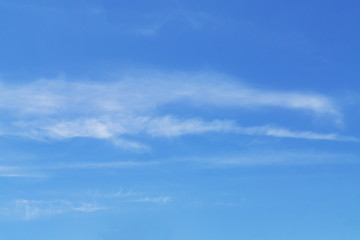 blye sky with white fluffy clouds background.