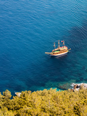 Aerial view of yacht, running along the shore
