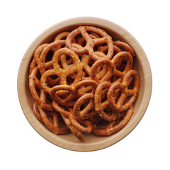 Food: wooden bowl full of salted pretzels, isolated on white background