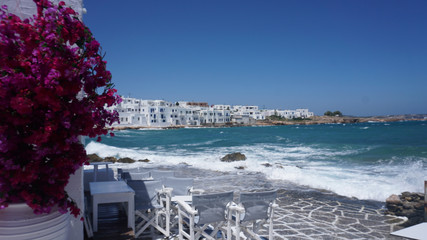 Photo of beautiful bougainvillea flower with awsome colors in picturesque Greek island with deep...