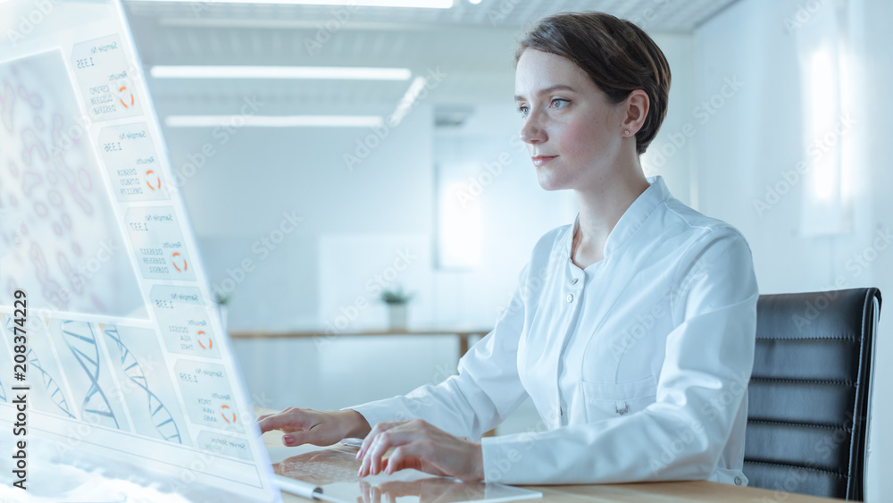 Poster portrait shot of a female scientists working on the transparent display computer in the futuristic l