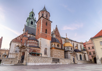 Fototapeta na wymiar Cathedral of St. Stanislaw and St. Vaclav and royal castle on the Wawel Hill at sunset, Krakow, Poland.
