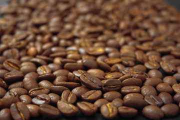 cereal coffee in bulk on a black background.