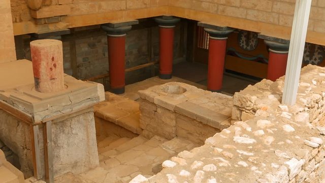 Slow panning shot of a temple within the complex of the Minoan Palace of Knossos, Heraklion, Crete, Greece