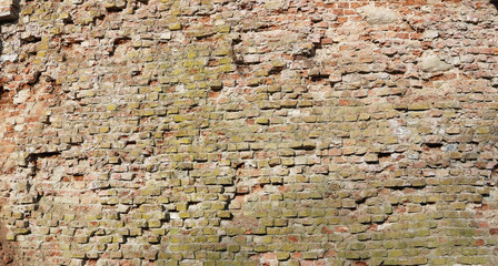 This wall was built three hundred years ago from self-made clay bricks