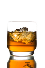 whiskey with ice on white background