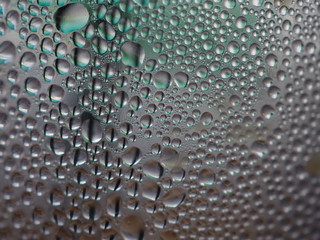 Water drops on the glass For design, textures and backgrounds.