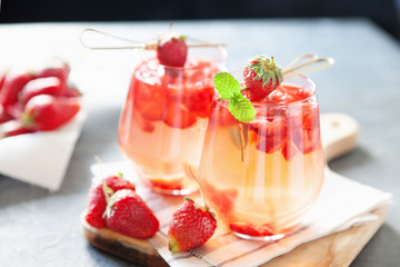Red strawberry juice with fresh berries