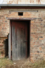 Old red timber door