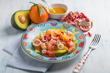 salad with avocado grapefruit orange and pomegranate