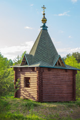 Fototapeta na wymiar Wooden chapel in the north of Russia