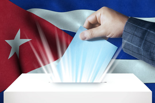 Cuba - Voting On Ballot Box With National Flag Background 