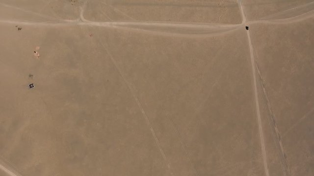 Amazing deserted yurts in gobi desert mongolia aerial drone shot