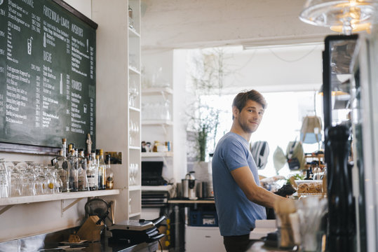 Portrait of smiling man in cafe