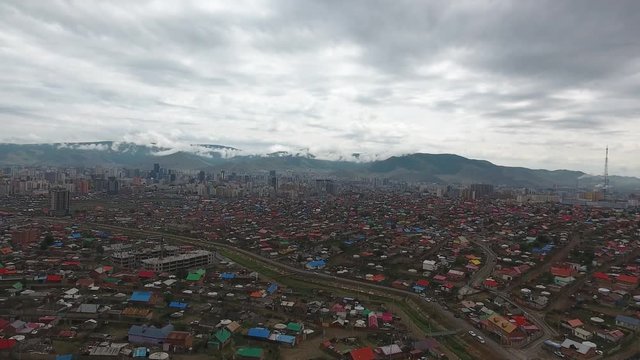 Aerial drone shot from top view dozen of yurts poor area in Mongolia ulan Bator