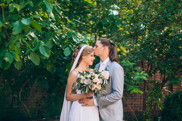 wedding couple. Beautiful bride and groom. Just merried. Close up. Happy bride and groom on their...