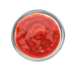 Bowl with delicious tomato sauce on white background