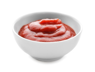 Bowl with delicious tomato sauce on white background