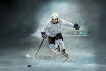 Obraz premium Caucasian ice hockey Players in dynamic action in a professional