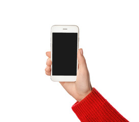 Young woman using phone on white background